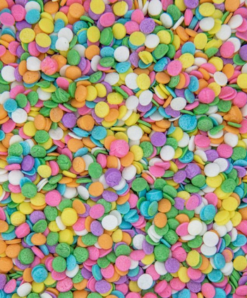 A close-up, vibrant, full-frame background of numerous colorful, flat, round confetti quins in various pastel rainbow shades.