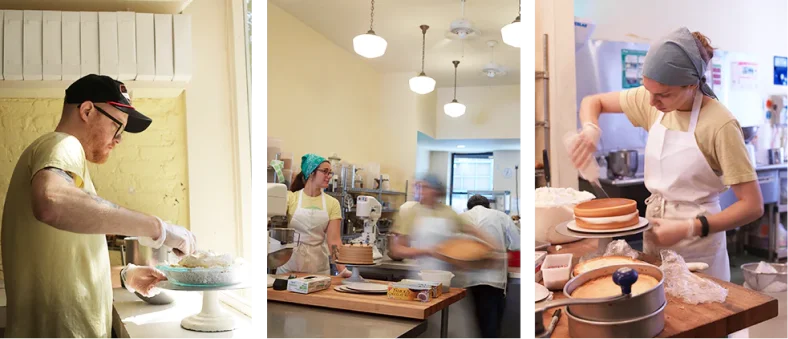 Bakery staff preparing and decorating cakes at Billy's Bakery, showcasing a man frosting a cake, a woman carrying a cake, and another woman decorating a cake with frosting.