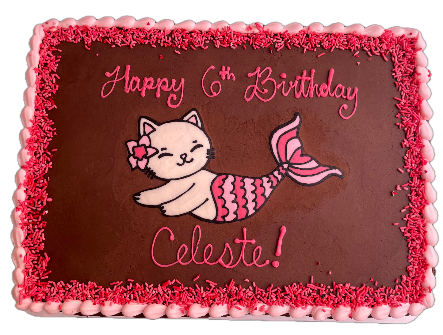 Birthday cake with a mermaid cat design and 'Happy 6th Birthday Celeste!' text on a brown background.