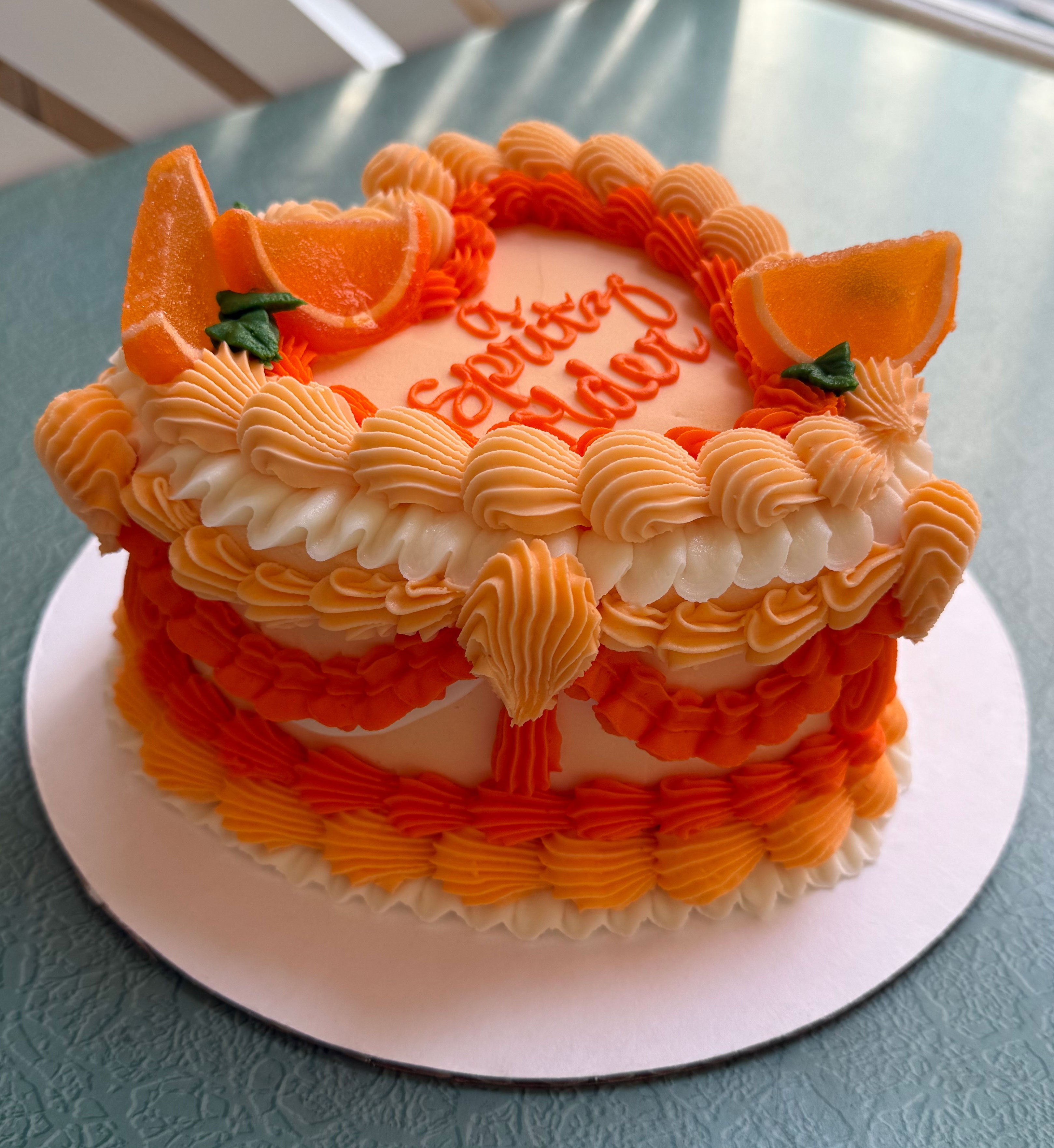 'A Spritz Older' Cake