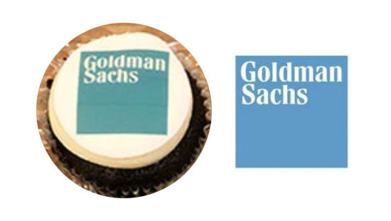 Photo of a cupcake with a printed edible image, side-by-side with the digital image of the logo imprinted. Used to show possible the color differences between the on-screen image and the printed image. 